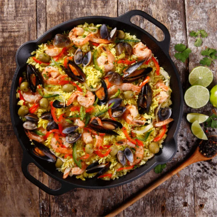 Paellera de hierro fundido 33cm con doble asa precurada - Imagen 4